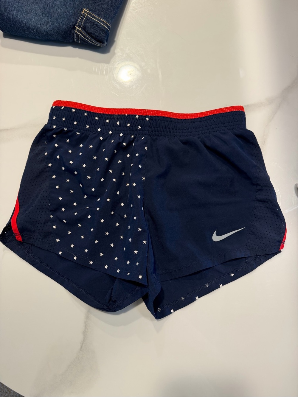 Nike Women's Navy Blue Star-Print Athletic Shorts with Red Trim